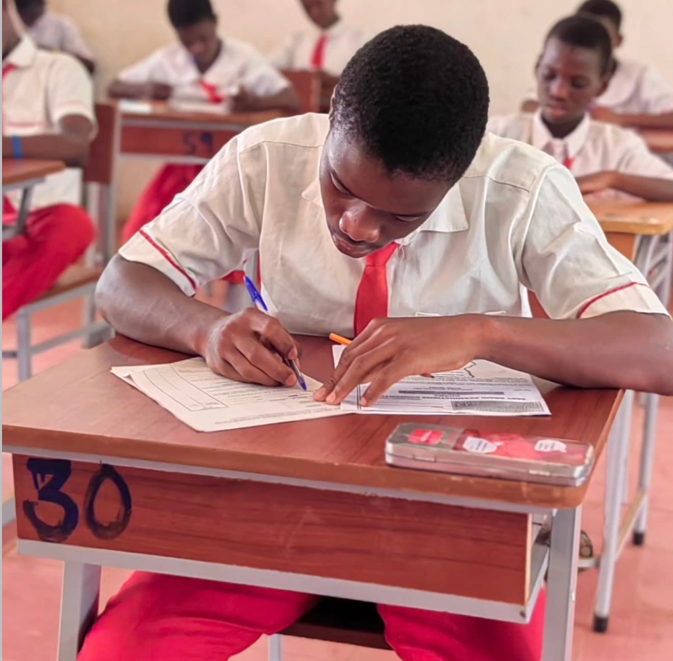 Students learning in a classroom at Northern COSTECH